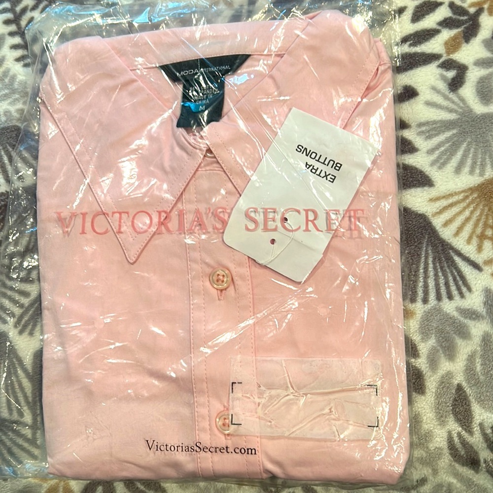 Pink woman’s dress shirt
